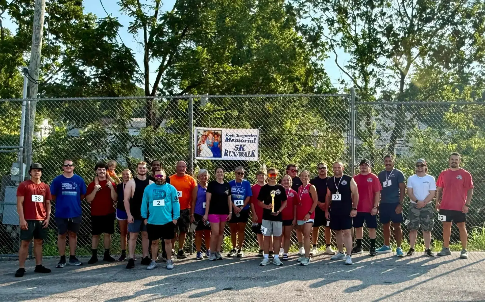 Group photo from the Josh Teegarden Memorial 5K Run/Walk hosted by Iron Cross Fitness